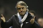 Vendekåbe. Roberto Mancini er i syv sind omkring titelafgørelsen i England. 
