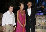 Topmøde. Mens den amerikanske præsident Barack Obama (th.) deltager i topmøde mellem lederne i Nord- og Sydamerika, så har hans stab travlt. 12 Secret Service-agenter har fået sparket ud af landet på grund af besøg hos prostituerede. 