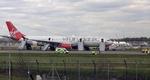 Nødlanding. Et Virgin Atlantic-fly blev tvunget på jorden op grund af en mindre brand om bord. 15 mennesker blev kvæstet. 