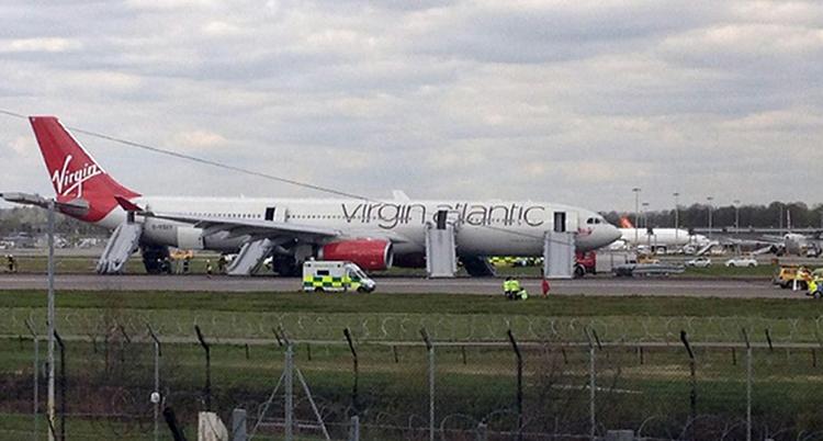 Nødlanding. Et Virgin Atlantic-fly blev tvunget på jorden op grund af en mindre brand om bord. 15 mennesker blev kvæstet. 