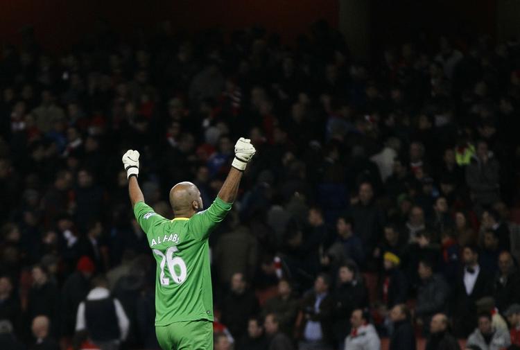 Vinder. Ali Al-Habsi og Wigan er på vej mod en nærmest mirakuløs redning i Premier League, hvor de indenfor få måneder har slået Liverpool, Manchester United og Arsenal. 