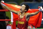 Guld. Bokseren Zou Shiming sikrede Kina OL-guld i letfluevægt på hjemmebane i Beijing i 2008. 