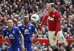 medrivende. Manchester United faldt sammen foran 4-2 blot otte minutter før tid. Og så hjalp det kun lidt, at Wayne Rooney (th) scorede to gange for topholdet. 