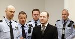 Tiltalt. Anders Behring Breivik bliver ført ind til sjette dag i retssagen mod ham. 