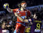 Angreb. Barcelona-forsvaret var opmærksomt på Mikkel Hansen, men helt stoppe ham kunne det ikke. 