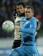 Mesterligaklar. Aleksandr Kerzhakov (forrest) scorede til 2-0 i Zenits sejr over Dynamo og er således klar til endnu en tørn i Champions League, hvor russerne i denne sæson nåede helt frem til 1/8-finalerne, hvor de dog tabte til Benfica. 