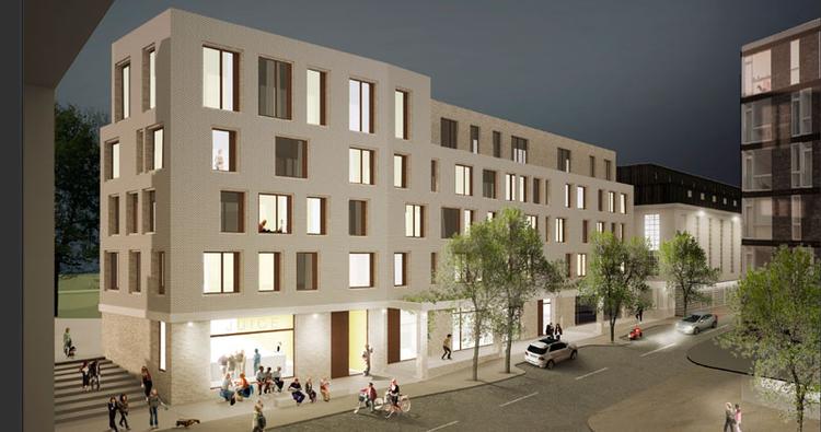 Nybyggeri. Den kommende bygning på Carlsberg-området, der er tegnet af .arkitektfirmaet Praksis Aps, får sit særpræg bl.a. i kraft af den lyse farve, der går igen i nabobygningen og i æresboligen i haven. 