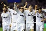 Glæde. Real Madrid-spillerne jubler efter at have brudt Barcelonas stime og taget kongeklubbens 32. mesterskab. 