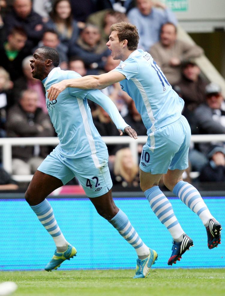 Matchvinder. Yaya Toure (t.v.) kom til City fra FC Barcelona i 2010 