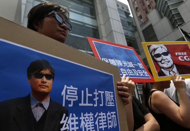 Opmærksomt. Chen Guangcheng satte menneskerettigheder øverst på dagsordenen ved sin blotte tilstedeværelse. 