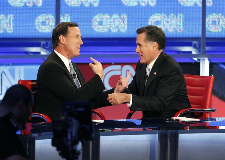 Duel. Rick Santorum (til venstre) og Mitt Romney var bestemt ikke altid lige gode venner under primærvalget. Her skændes de under en debat i Arizona. 
