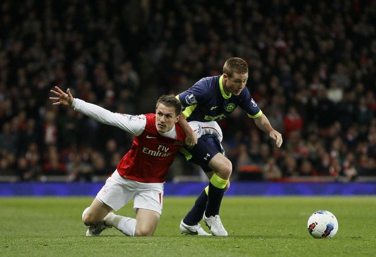Succes.  James McCarthy (t.h.) har været stærkt spillede for Wigan i foråret, hvor klubben med sensationssejre over Liverpool, Man. United og Arsenal kravlede ud af nedrykningszonen. 