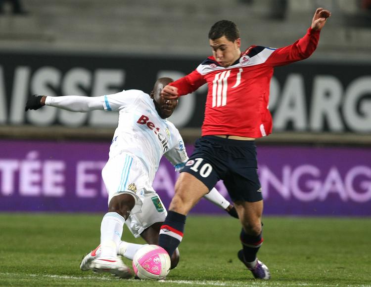 Farvel. Eden Hazard (t.h.) afleverer LIlle på en Champions League-plads. Med to runder tilbage i Ligue 1 er klubben fem point efter topholdet Montpellier. 