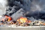 eksplosioner. Det officielle nyhedsbureau SANA i Syrien har frigivet dette billede. To bilbomber blev i morges bragt til sprængning i Qazaz-bydelen i Damaskus. 