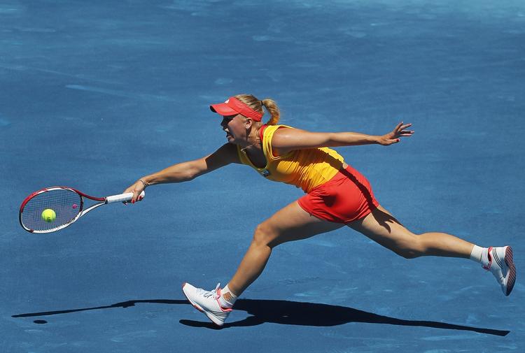 Ude. Wozniacki løb mange gang forgæves efter Williams yderligt placerede slag. 