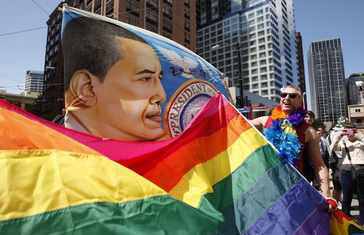 Glæde. Demonstranter viste deres support til Barack Obamas syn på homovielser i Seattle torsdag. 