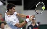 Farvel. Novak Djokovic er som mange andre meget lidt begejstret for det blå grus i Madrid. 