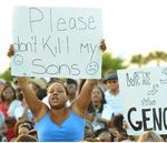 PROTEST. Demonstranter tager afstand fra drabet på Trayvon Martin under en march i Florida i marts. 