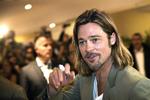 Ikon. Brad Pitt kan få selv sikkerhedsvagterne til at fiske mobilen frem. 