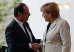 Krisemiddag. Frankrigs præsident François Hollande og Tysklands forbundskansler Angela Merkel er ikke helt enige om, hvilken kur Europa trænger til. 