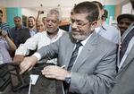VALGVINDER. Mohamed Morsi har ifølge Det Muslimske Broderskab i Egypten fået flest stemmer ved præsidentvalget. Han skal nu ud i anden valgrunde mod Ahmed Shafiq. 