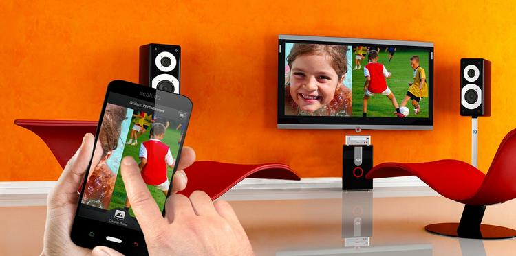 GENVEJ. PhotoBeamer skaber en direkte forbindelse mellem f.eks. din iPhone og en webbrowser på et TV, så man kan vise billeder fra telefonen uden kabler eller besværlige uploads. 