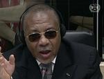 Charles Taylor, Liberias krigsforbrydersigtede ekspræsident i vidneskranken ved en særlig krigsforbrydertribunal i Haag. 