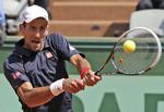 Videre. Djokovic havde ikke altid den rigtige længde på sine slag i opgøret mod den standhaftige slovener. 