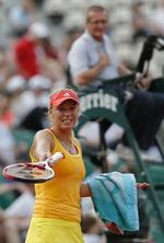 optur. Caroline Wozniacki gik ned i kampen mod  Kaia Kanepi og røg ud af French Open. Men hun avancerer på verdensranglisten. 