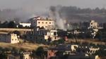 angreb. Dette billede stammer fra en amatør-video distribueret fra Shaam News Network og viser angiveligt røg, der stiger til vejrs fra byen Rastan i Homs-provinsen, efter et angreb fra syriske regeringstropper. Billedet er videregivet af AP, der ikke kan verificere billedets autencitet. 