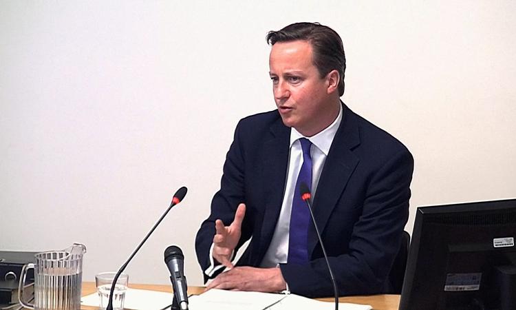Høring. David Cameron blev i dag afhørt om sit bånd til den skandaleramte mediekonge Rupert Murdoch. 