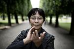 Forbud. Bao Xuezhen laver her en af de fem øvelser, som er en del af den religiøse bevægelse Falun Gongs vigtigste elementer. 