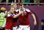 Håb. De danske spillere jubler efter udligningen mod Tyskland. Selv om det ikke rakte til en kvartfinale, har landsholdet en lys fremtid, mener flere eksperter. 