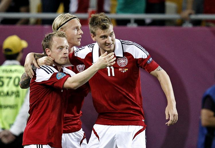 Håb. De danske spillere jubler efter udligningen mod Tyskland. Selv om det ikke rakte til en kvartfinale, har landsholdet en lys fremtid, mener flere eksperter. 
