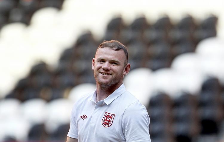 REDNINGSMAND. Wayne Rooney er tilbage efter karantæne og klar til at sparke England i kvartfinalen. 