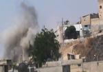 URO. Dette billede er sluppet ud fra Syrien og forestiller angiveligt røg fra bygninger i provinsen Homs. 