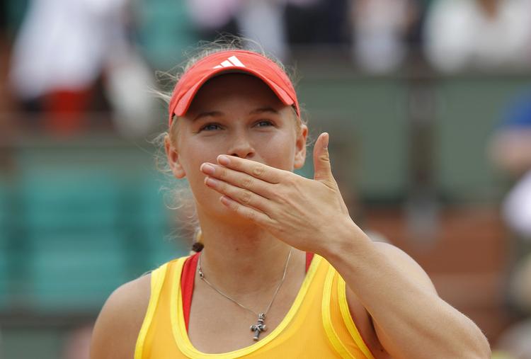 Doublechance. Caroline Wozniacki er klar til at kæmpe for Wimbledontrofæet i to rækker. 