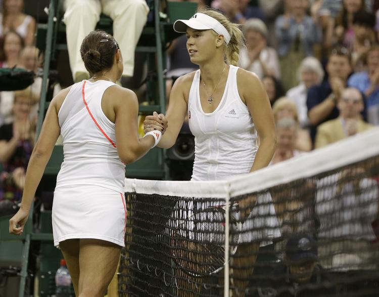 CHANCELØS? Team Danmark tror ikke længere på, at Caroline Wozniacki kan hente en OL-medalje til Danmark. 