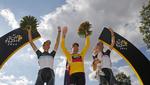 Podiet. Cadel Evans vandt i 2011 foran de to Schleck-brødre. I år er Andy ude med en skade og Fränk igen outsider. 