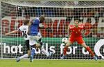 dobbelt. Mario Balotelli scorede først med hovedet og derefter en imponerende mål helt oppe i målhjørnet. Og efter 70 minutter blev han skiftet ud med krampe. 