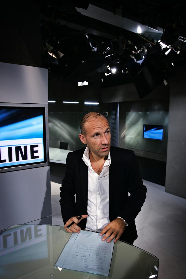 Akademiker. Adam Holm (f. 1969) er ph.d. i moderne historie. 