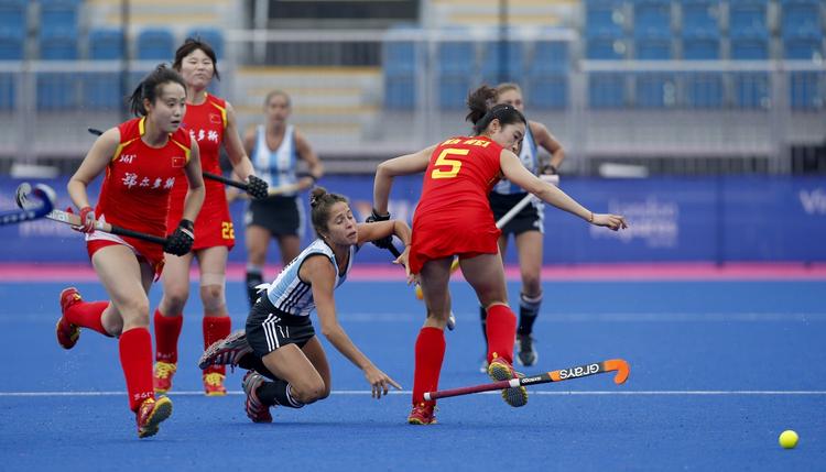 clenbuterol. Kinas hockeylandshold forbereder sig til OL på den olympiske arena i London i en træningskamp mod Argentina i maj i år. 