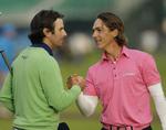 Toppræstation. Sådan ser man ud, når man lige har gået en superrunde ved British Open. Thorbjørn Olesen (til højre) giver hånd til sydafrikanske Thomas Aiken, som han gik anden runde med. 