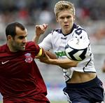1-2. Om Dila-anfører Lasha Salukvadze  (t.v.) er med i morgen, ved Aron Johannsson og AGF'erne ikke noget om. De bliver klogere når der fløjtes i gang. 