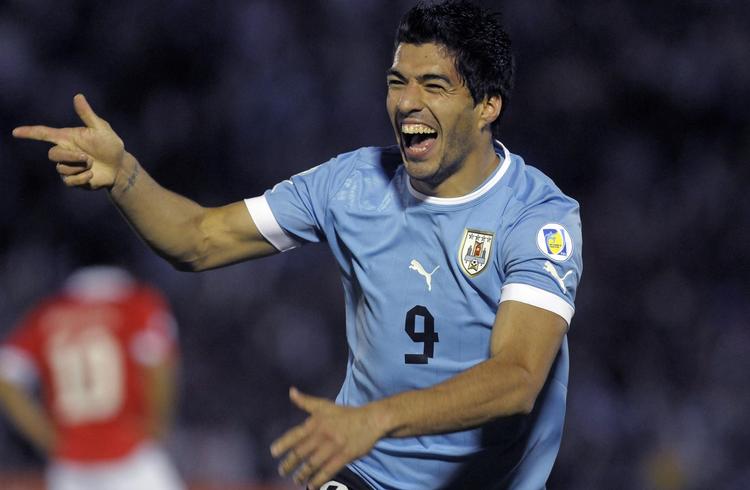 Superstjerne. Liverpool-angriberen Luis Suarez er en af mange store navne, der deltager i den olympiske turnering, som er forbeholdt spillere på max. 23 år. 