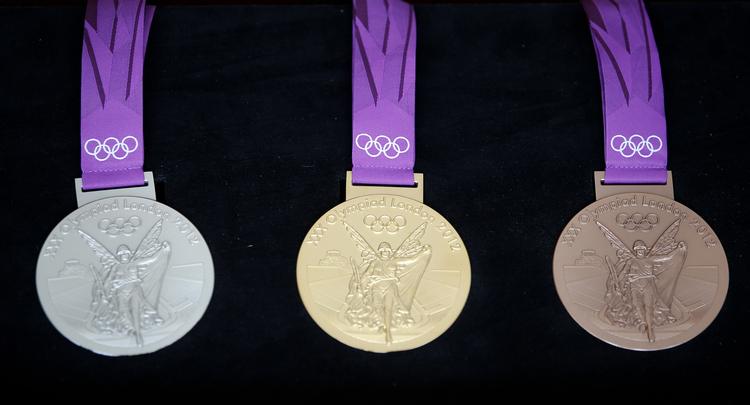 MEDALJER. Skal man tro danskerne, er der ikke mange danske atleter, der kommer hjem med en OL-medalje. 