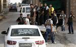 Oprør. Syriske oprørere gør sig klar nogle kilometer uden for Aleppo. 