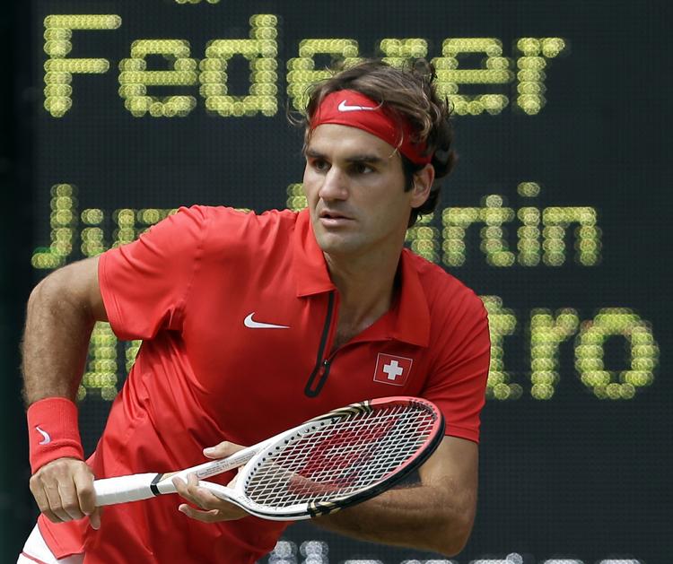 STÆDIG. Roger Federer brugte til slut sin store rutine og fik brudt Juan MArtin del Potro. 