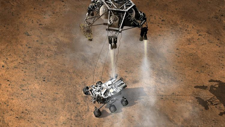 mars. Nasas svævende rumkran skal sikre, at Curiosity lander sikkert på Mars' overflade. 