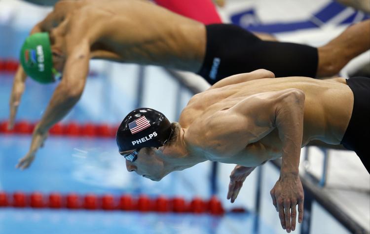 GULD. Også 100 meter butterfly gav for tredje OL i træk guld til Michael Phelps, der er storfavorit til guldmedalje nummer 18, når 4x100 meter medley i morgen afrunder OL-svømningen. 